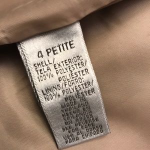 Jacqueline Ferrar over coat